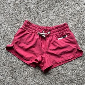 Vuori Dash Shorts 2.0 in a pink/rosewood shorts Women’s XS
